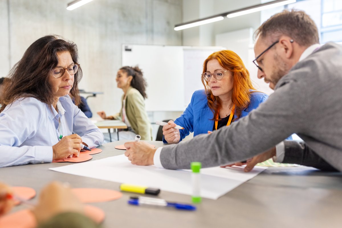 Working adults on a professional training course